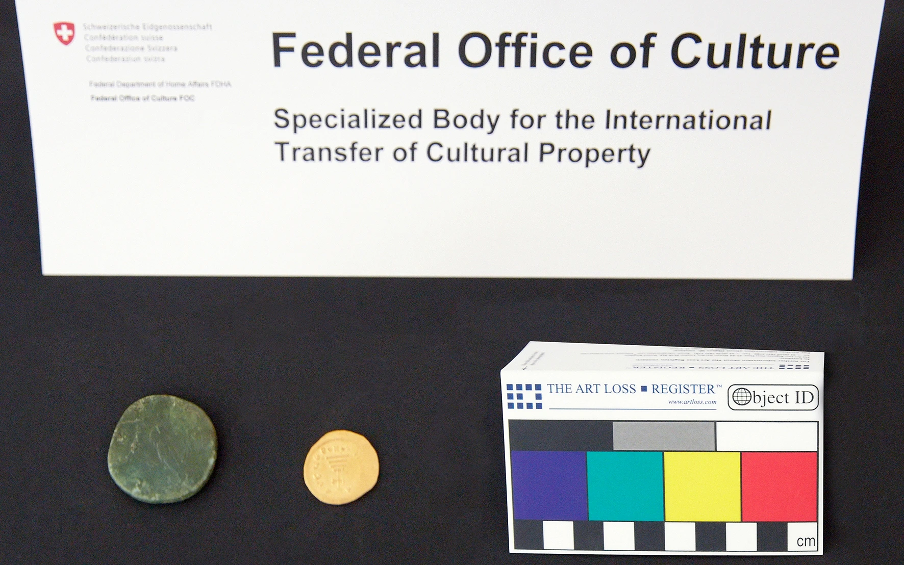 Sestertius of Diva Faustina dating from the 2nd century AD and Byzantine solidus, a gold coin bearing the effigy of Heraclius from the 7th century AD